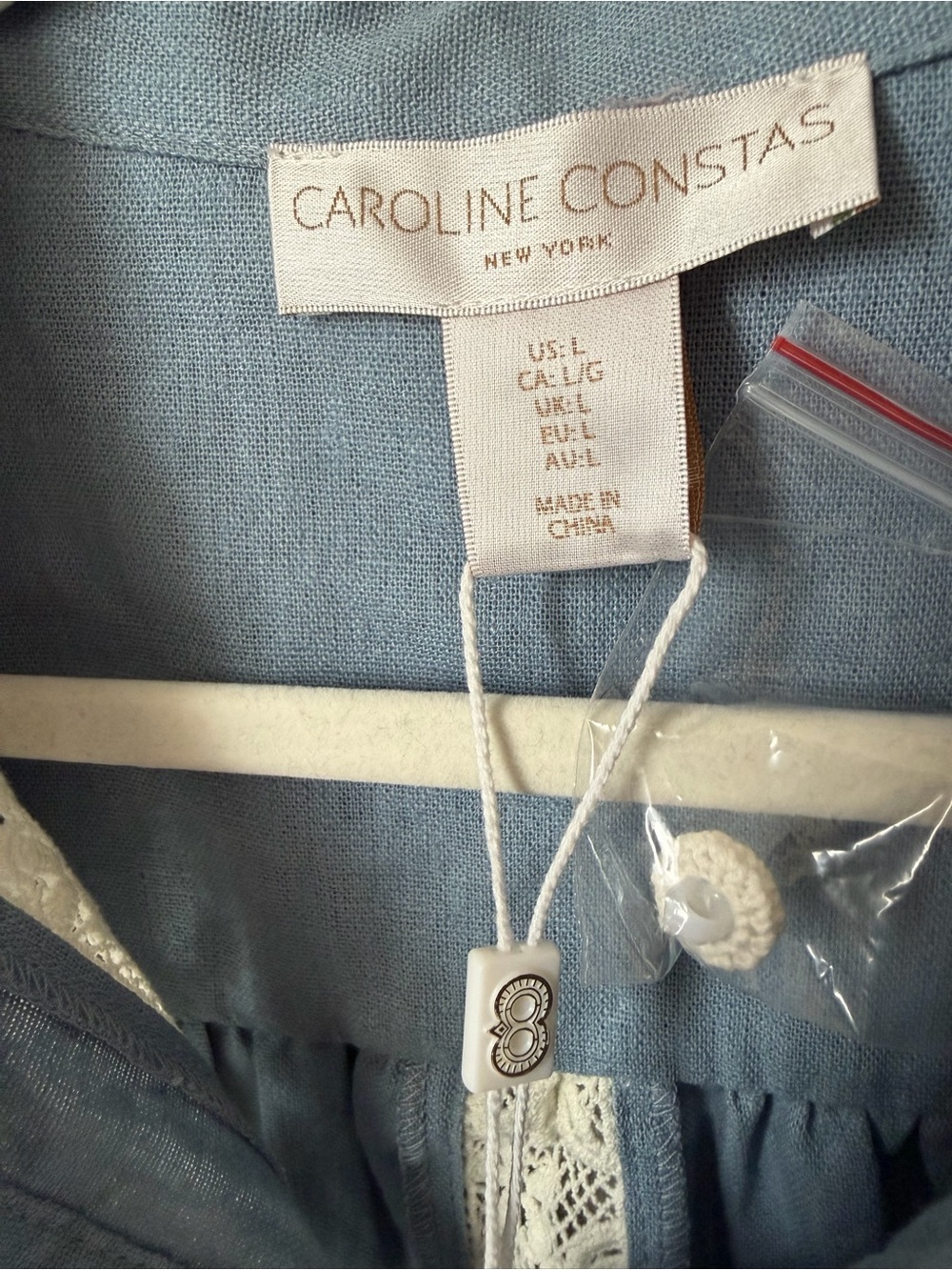 Blue short sleeve button up blouse with Cream Lace Trim - Picture 5 of 6